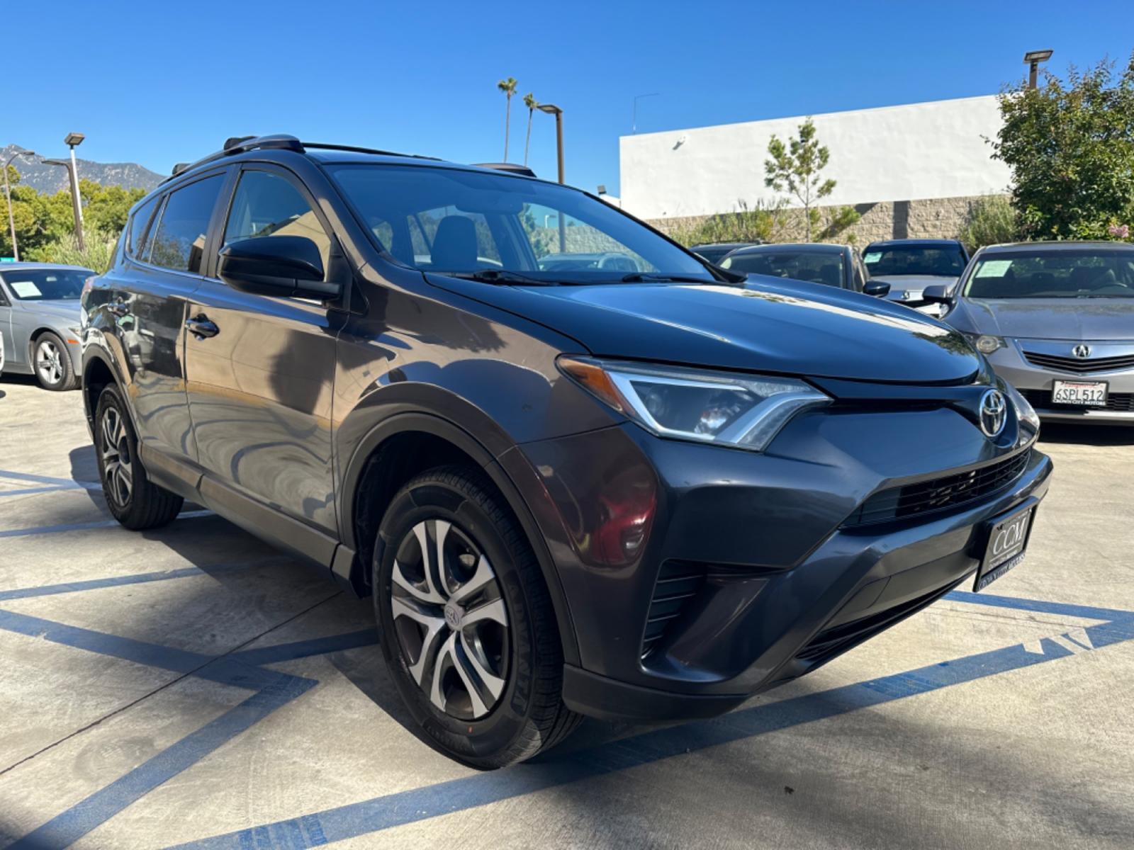 2016 Gray /Black Toyota RAV4 (JTMZFREVXGJ) , AUTOMATIC transmission, located at 30 S. Berkeley Avenue, Pasadena, CA, 91107, (626) 248-7567, 34.145447, -118.109398 - Crown City Motors is a used “Buy Here Pay Here” car dealer in Pasadena CA. “Buy Here Pay Here” financing, means that when you purchase your vehicle from our dealership, that you make the payments to the dealership as well. We do not need the banks approval to get you approved for a used auto - Photo #5